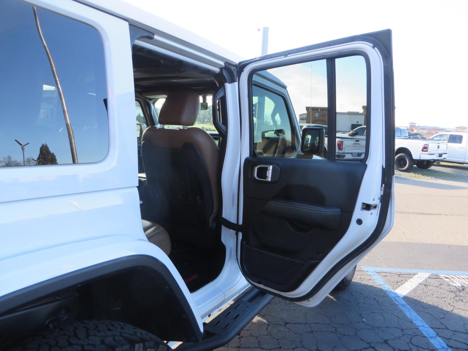 2020 White /TAN Jeep Wrangler Unlimited Rubicon (1C4HJXFG8LW) with an 3.6L V6 DOHC 24V FFV engine, 6A transmission, located at 2630 Grass Valley Highway, Auburn, CA, 95603, (530) 508-5100, 38.937893, -121.095482 - 3" Zone offroad suspension system, Fox adventure series shocks, rocksliders, Teraflex HD tire relocation, Mopar HD tailgate hinge, 17" KMC wheels, and 37" BFG KO2 tires. - Photo #52